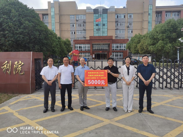 传递大爱 情暖“六一”——民建阜阳市直二支部慰问儿童福利院2022-1.png